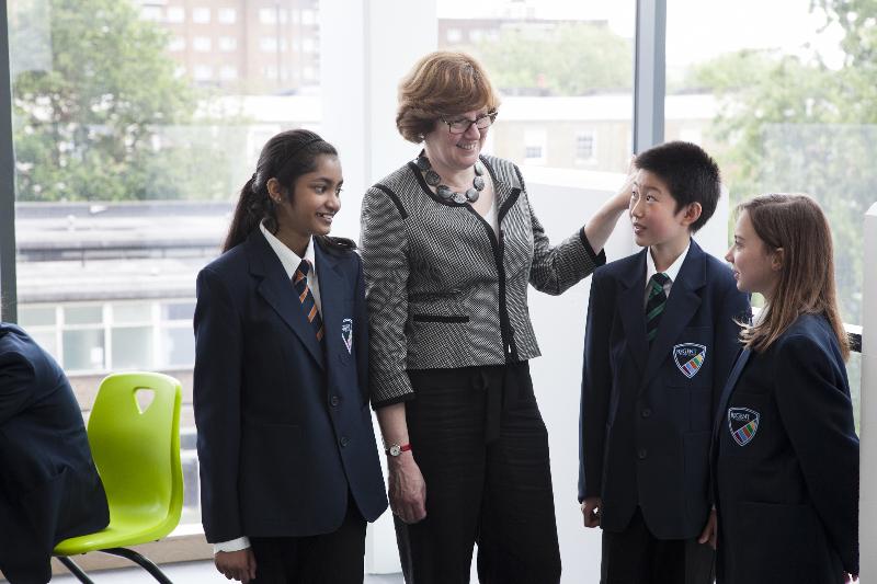 Headteacher with students